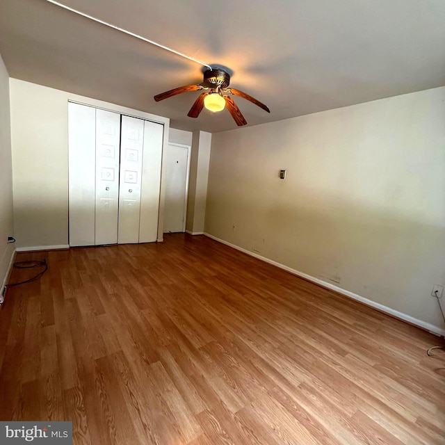 5565 Columbia Pike Unit 210, Arlington, VA 22204 - unfurnished bedroom with light wood-style flooring and ceiling fan