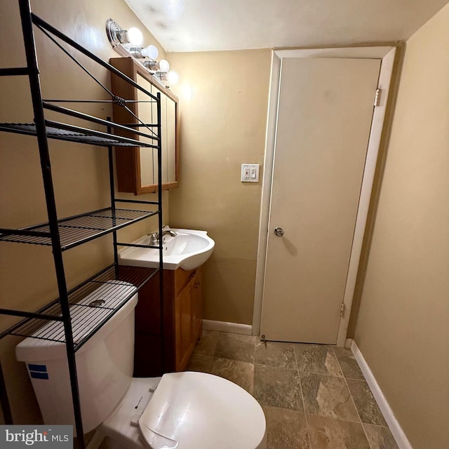 5565 Columbia Pike Unit 210, Arlington, VA 22204 - bathroom with vanity and stone finish flooring