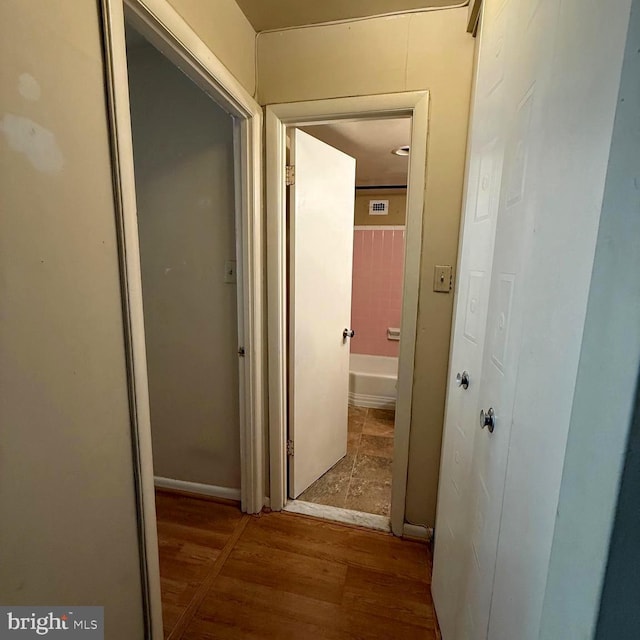 5565 Columbia Pike Unit 210, Arlington, VA 22204 - hallway featuring wood finished floors