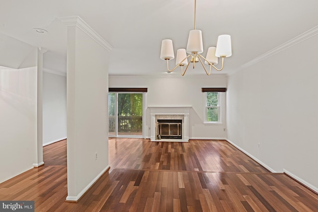 9405 Odyssey Ct, Burke, VA 22015 - unfurnished living room featuring healthy amount of natural light, crown molding, wood finished floors, a chandelier, and a fireplace with flush hearth