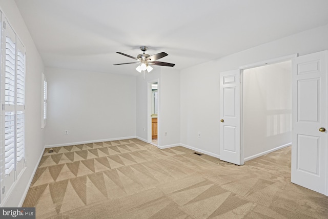 9405 Odyssey Ct, Burke, VA 22015 - empty room featuring light colored carpet and a ceiling fan