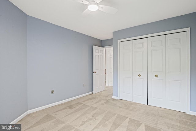9405 Odyssey Ct, Burke, VA 22015 - unfurnished bedroom with carpet, a closet, and a ceiling fan