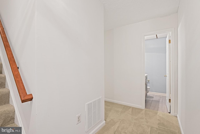 9405 Odyssey Ct, Burke, VA 22015 - hallway with carpet floors and stairway