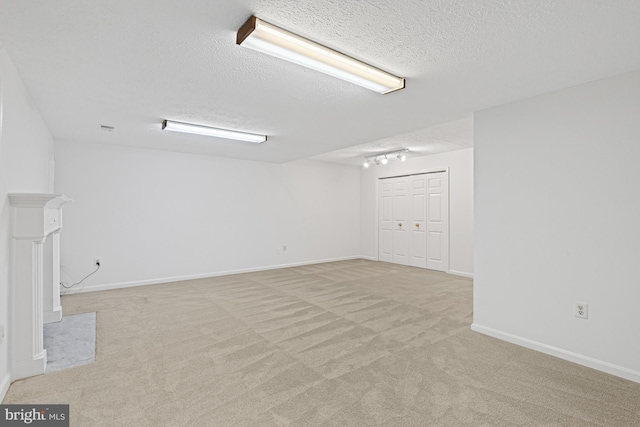 9405 Odyssey Ct, Burke, VA 22015 - finished below grade area with light carpet and a textured ceiling