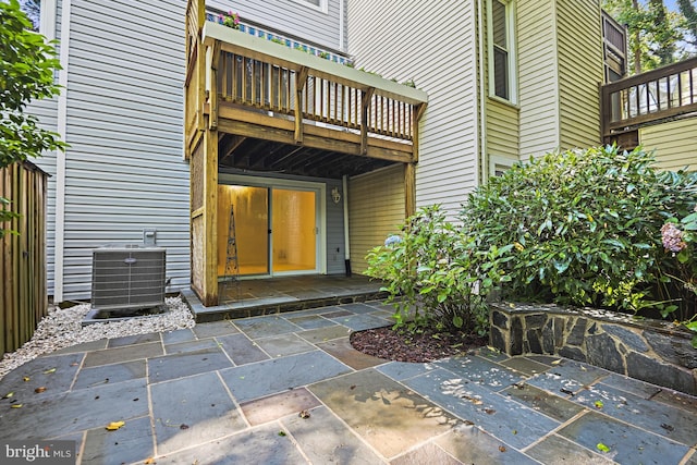 9405 Odyssey Ct, Burke, VA 22015 - view of exterior entry featuring a balcony and a patio