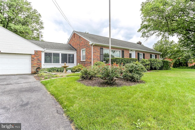 518 E Winding Hill Rd, Mechanicsburg, PA 17055 - view of front of property featuring brick siding, an attached garage, a front yard, driveway, and a chimney