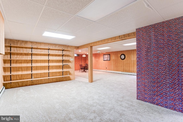 518 E Winding Hill Rd, Mechanicsburg, PA 17055 - finished basement with baseboard heating, carpet flooring, a drop ceiling, and wooden walls