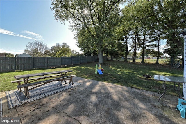 607 Salem Ave, Hagerstown, MD 21740 - fenced backyard with a patio area and outdoor dining space