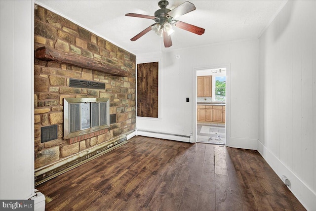607 Salem Ave, Hagerstown, MD 21740 - unfurnished living room with a baseboard radiator, a fireplace, crown molding, dark wood finished floors, and ceiling fan