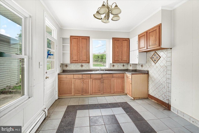 607 Salem Ave, Hagerstown, MD 21740 - kitchen with a chandelier, ornamental molding, open shelves, dark countertops, and backsplash