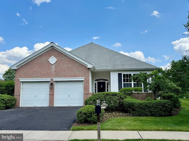 32 Brewster Ct, Pennington, NJ 08534 - view of front of house with brick siding, an attached garage, driveway, and a shingled roof