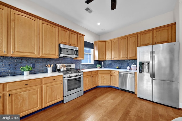 32 Brewster Ct, Pennington, NJ 08534 - kitchen featuring stainless steel appliances, light wood-style floors, light countertops, a ceiling fan, and recessed lighting
