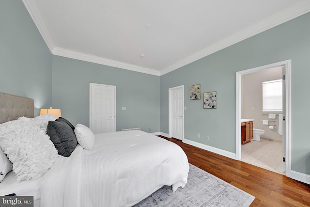 32 Brewster Ct, Pennington, NJ 08534 - bedroom featuring crown molding, wood finished floors, and ensuite bath