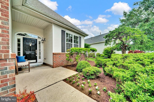 32 Brewster Ct, Pennington, NJ 08534 - entrance to property featuring brick siding and a shingled roof