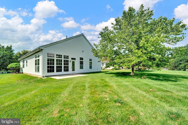32 Brewster Ct, Pennington, NJ 08534 - back of property featuring a yard and a patio area