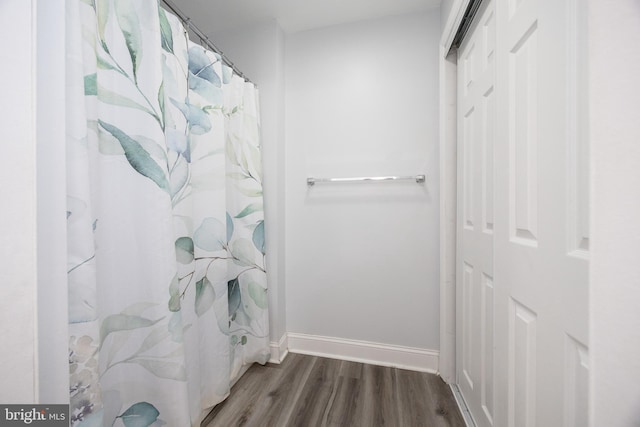 661 Schoolside Ln, Swarthmore, PA 19081 - full bathroom featuring wood finished floors and a shower with curtain