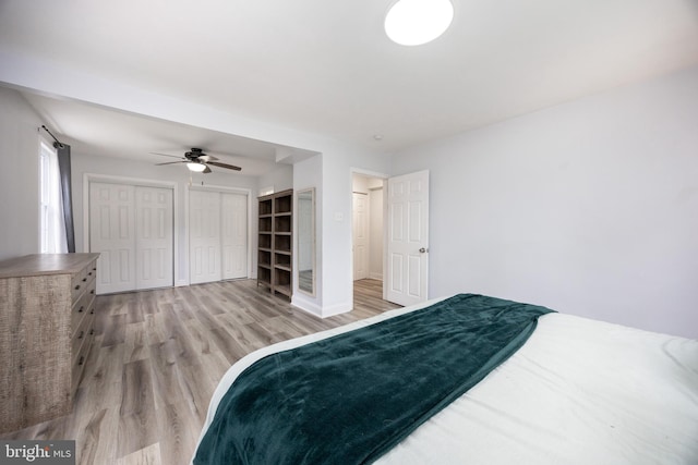 661 Schoolside Ln, Swarthmore, PA 19081 - bedroom with light wood-type flooring, two closets, and a ceiling fan