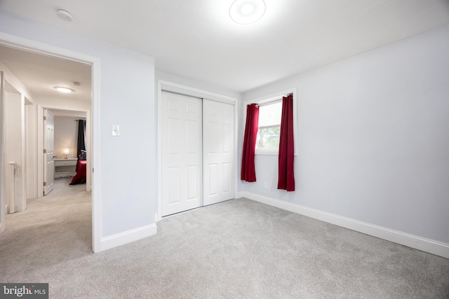 661 Schoolside Ln, Swarthmore, PA 19081 - unfurnished bedroom featuring light carpet and a closet