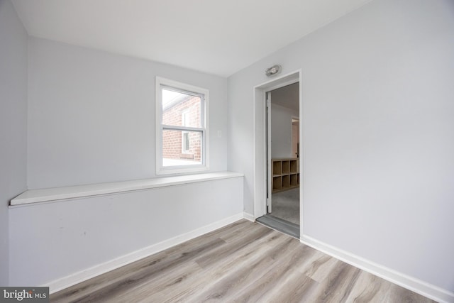 661 Schoolside Ln, Swarthmore, PA 19081 - spare room featuring wood finished floors and baseboards