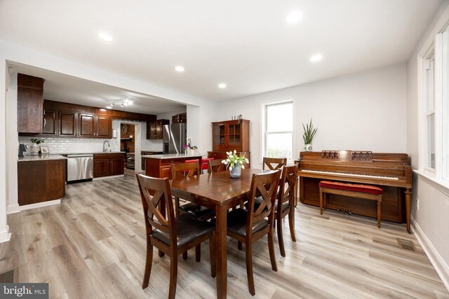 661 Schoolside Ln, Swarthmore, PA 19081 - dining space with light wood-style flooring and recessed lighting