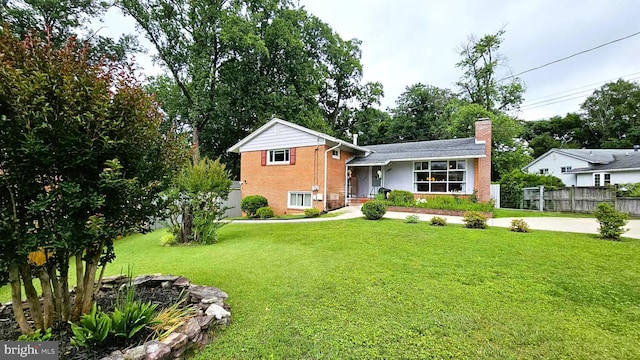 4753 Pomponio Pl, Annandale, VA 22003 - view of front facade featuring brick siding and a chimney
