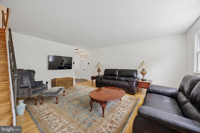 7512 Valley Ave, Philadelphia, PA 19128 - living room featuring stairs and light wood-type flooring