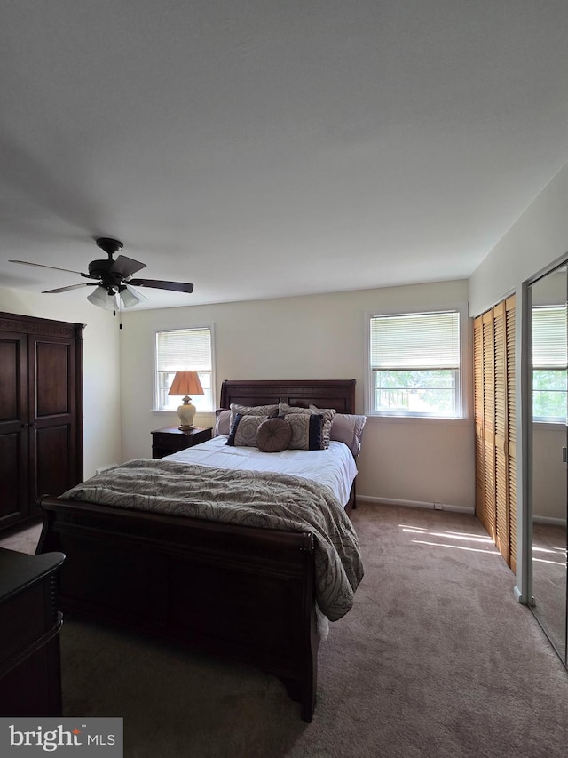 7512 Valley Ave, Philadelphia, PA 19128 - carpeted bedroom with multiple windows, a ceiling fan, and multiple closets