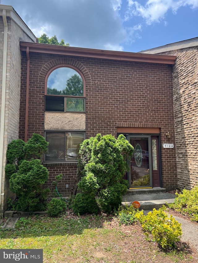 7104 Ora Glen Ct, Greenbelt, MD 20770 - doorway to property with brick siding