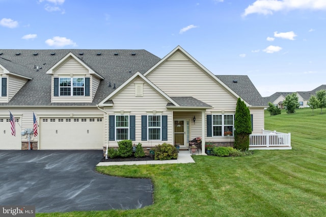 1080 Arbour Ln, Quakertown, PA 18951 - view of front of house featuring roof with shingles, driveway, a front yard, and an attached garage