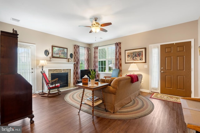 1080 Arbour Ln, Quakertown, PA 18951 - living area with wood finished floors, ceiling fan, and a premium fireplace