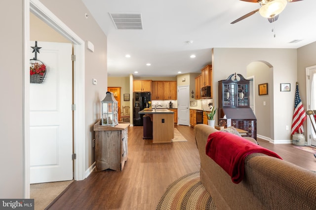 1080 Arbour Ln, Quakertown, PA 18951 - living area with arched walkways, ceiling fan, wood finished floors, and recessed lighting