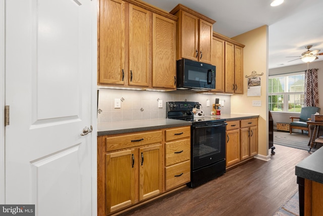 1080 Arbour Ln, Quakertown, PA 18951 - kitchen with black appliances, dark wood-style floors, a ceiling fan, tasteful backsplash, and dark countertops