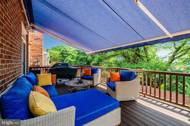 8162 Madrillon Ct, Vienna, VA 22182 - wooden terrace with grilling area and outdoor lounge area