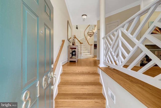 8162 Madrillon Ct, Vienna, VA 22182 - entrance foyer featuring stairway, light wood-style floors, and crown molding