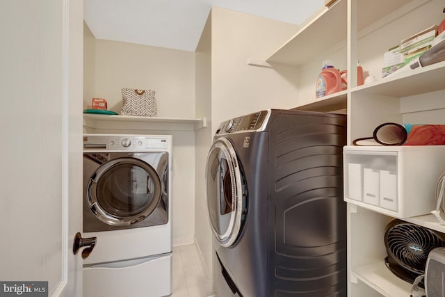 8162 Madrillon Ct, Vienna, VA 22182 - washroom with independent washer and dryer and tile patterned floors