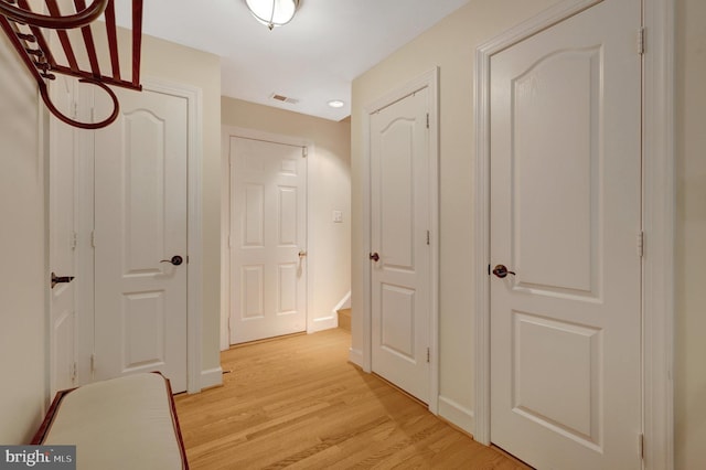 8162 Madrillon Ct, Vienna, VA 22182 - hallway featuring light wood-type flooring and baseboards