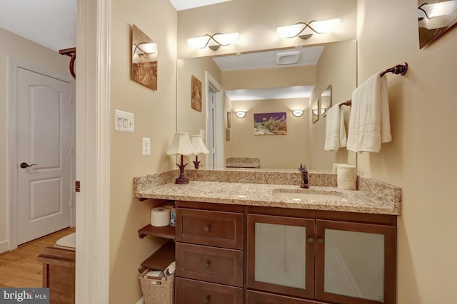 8162 Madrillon Ct, Vienna, VA 22182 - bathroom with vanity and wood finished floors