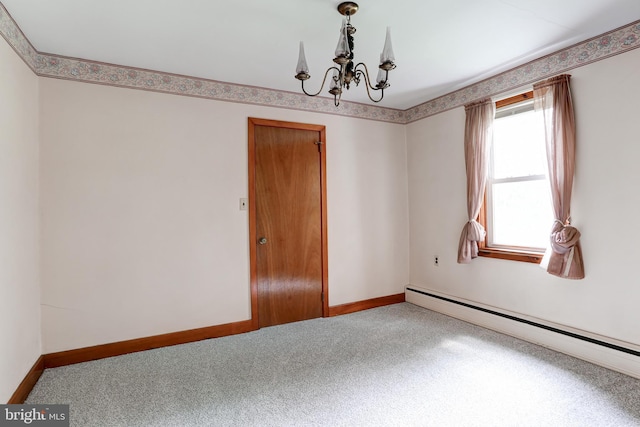 175 Dellville Rd, Duncannon, PA 17020 - carpeted empty room featuring a baseboard heating unit and a chandelier
