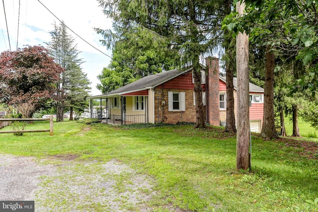 175 Dellville Rd, Duncannon, PA 17020 - view of front of property with a chimney, stone siding, and a porch