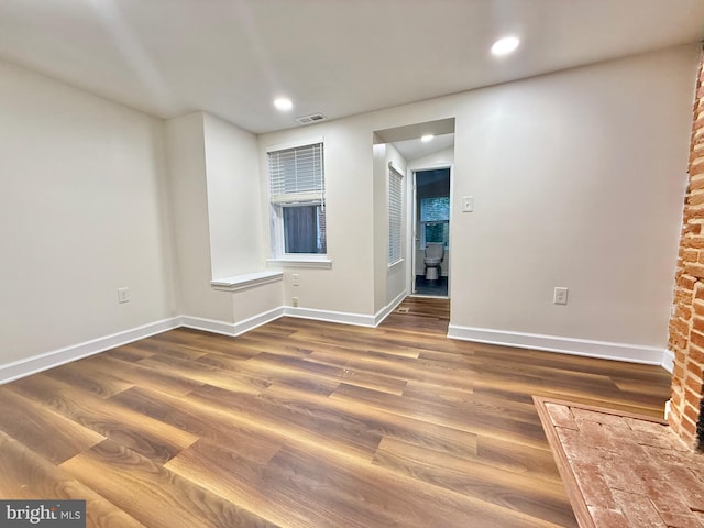 123 E Cross St, Baltimore, MD 21230 - spare room featuring wood finished floors and recessed lighting