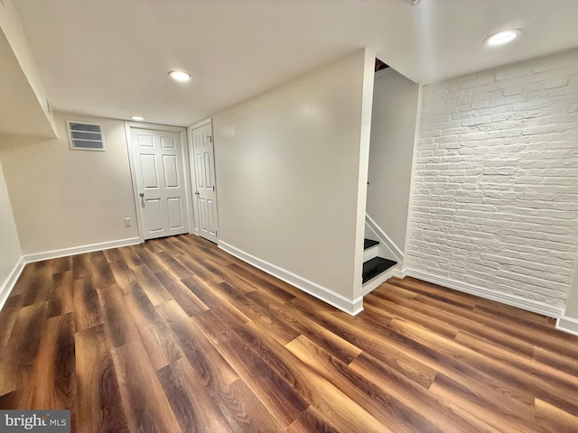 123 E Cross St, Baltimore, MD 21230 - finished below grade area with dark wood-style flooring, recessed lighting, and stairway