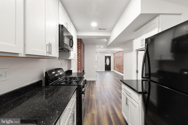 123 E Cross St, Baltimore, MD 21230 - kitchen with black appliances, dark wood-type flooring, and white cabinetry