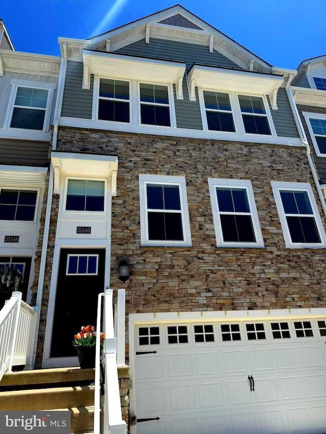 35146 Wright Way, Millsboro, DE 19966 - townhome / multi-family property with an attached garage and stone siding