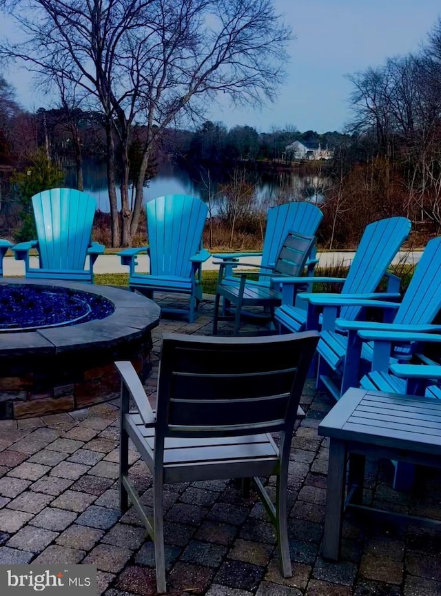 35146 Wright Way, Millsboro, DE 19966 - view of patio featuring an outdoor fire pit and a water view