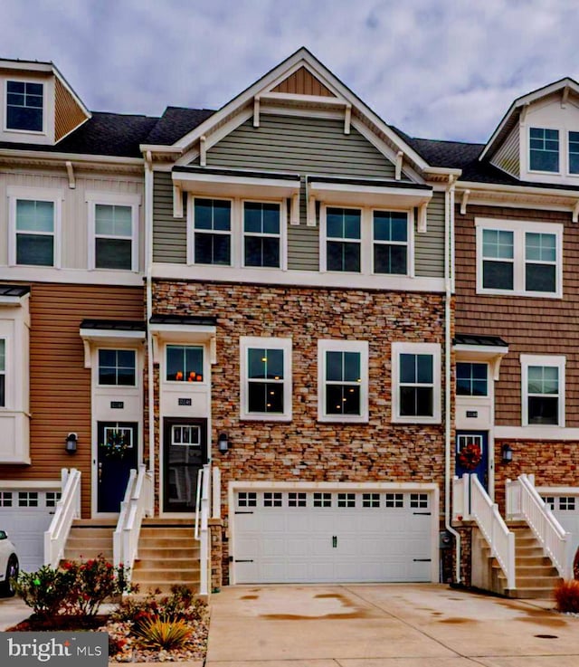 35146 Wright Way, Millsboro, DE 19966 - multi unit property featuring a garage, concrete driveway, and stone siding