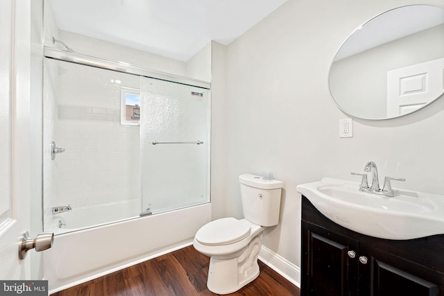 223 Hudson St, Gloucester City, NJ 08030 - full bathroom with wood finished floors, vanity, and shower / bath combination with glass door
