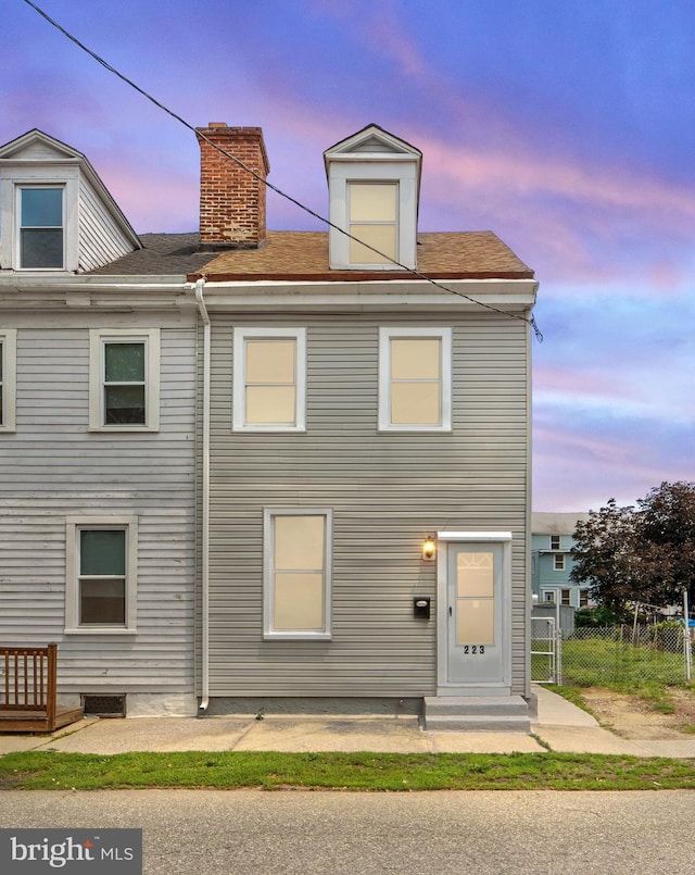 223 Hudson St, Gloucester City, NJ 08030 - back of house at dusk with a chimney