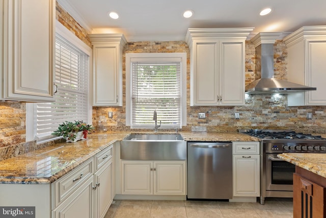 4600 Atlantic Ave, Atlantic City, NJ 08401 - kitchen with stainless steel appliances, wall chimney exhaust hood, backsplash, and light stone countertops