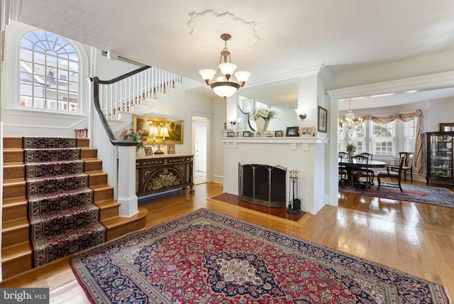 4600 Atlantic Ave, Atlantic City, NJ 08401 - living room featuring a chandelier, wood finished floors, and stairway