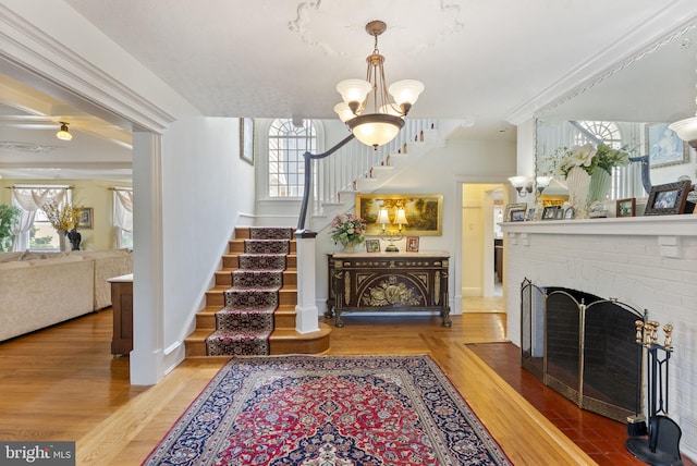 4600 Atlantic Ave, Atlantic City, NJ 08401 - living area featuring stairway, plenty of natural light, wood finished floors, and a chandelier